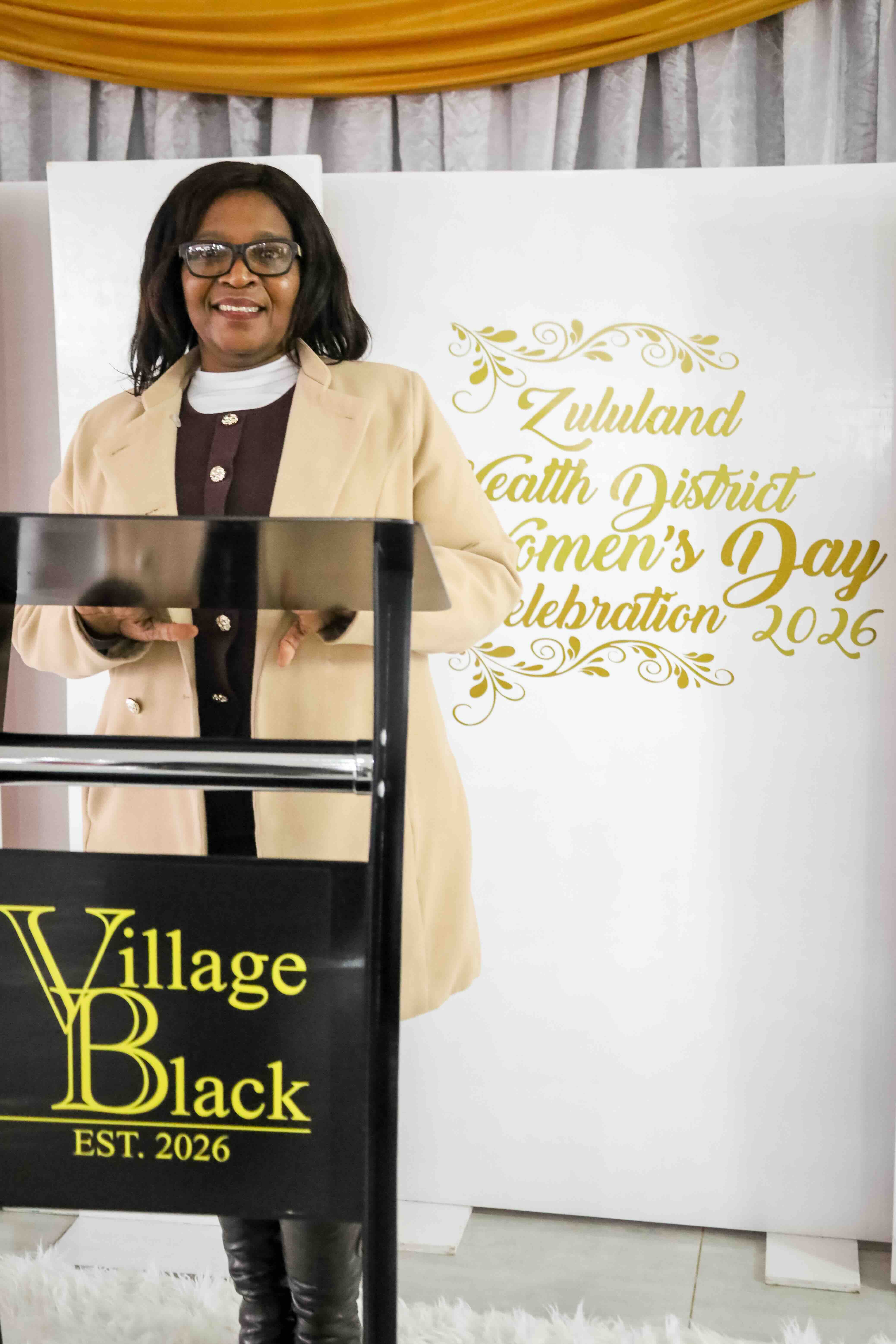 Village Black lectern at Women's Day
